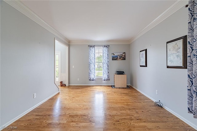 3020 Irena Ln, Twinsburg, OH 44087 - empty room featuring crown molding, light wood-style flooring, and baseboards