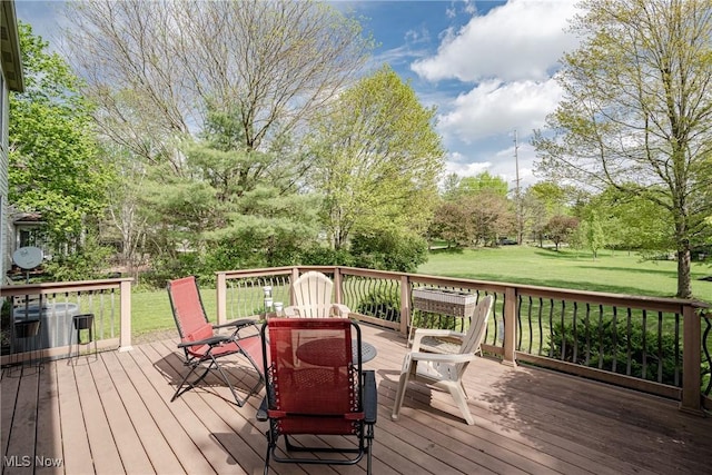 3020 Irena Ln, Twinsburg, OH 44087 - deck with outdoor dining area, a lawn, and view of scattered trees