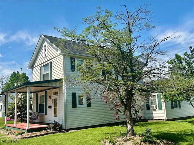 805 4th St, Saint Marys, WV 26170 - back of property with a lawn and covered porch