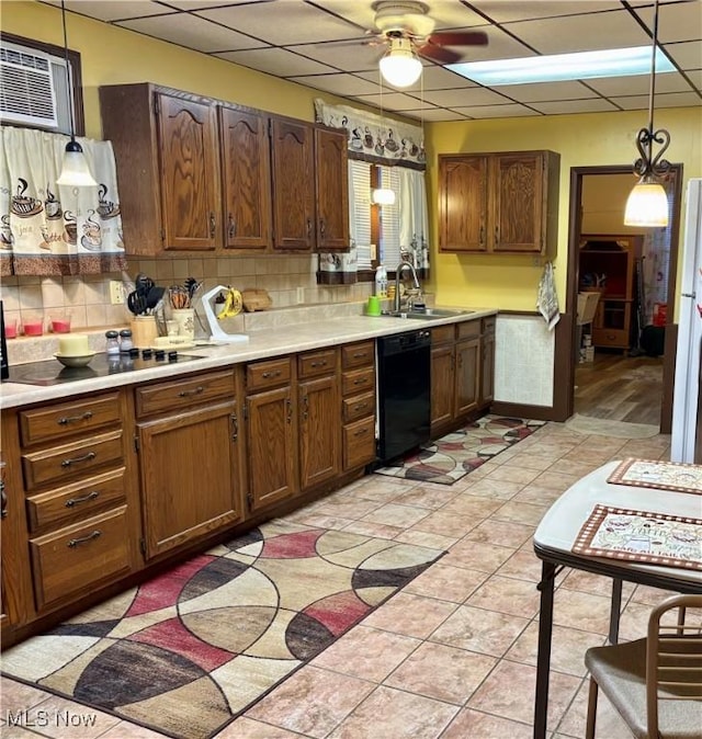 805 4th St, Saint Marys, WV 26170 - kitchen featuring a sink, black appliances, a ceiling fan, decorative backsplash, and a paneled ceiling