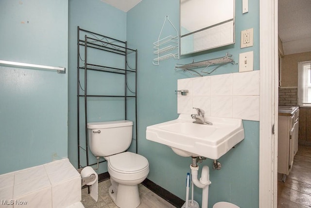 5008 Dolloff Rd, Cleveland, OH 44127 - bathroom featuring toilet