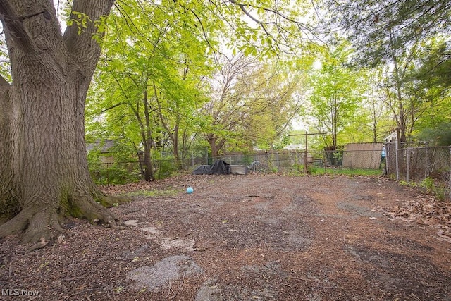 5008 Dolloff Rd, Cleveland, OH 44127 - view of yard with fence