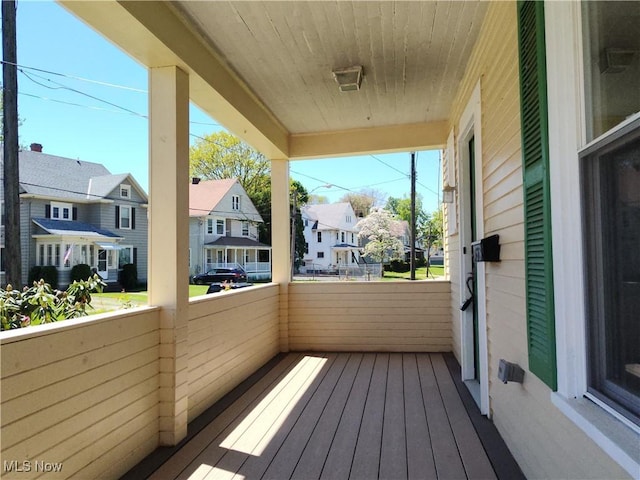balcony featuring a residential view