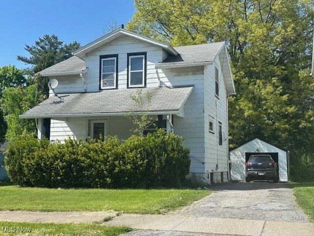 632 Samuel Ave, Youngstown, OH 44502 - view of front of home with a detached garage, an outbuilding, and a shingled roof