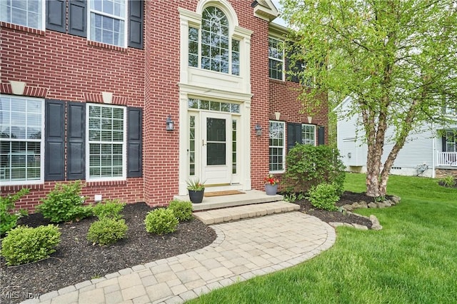 1284 Spafford Dr, Copley, OH 44321 - property entrance featuring brick siding and a lawn