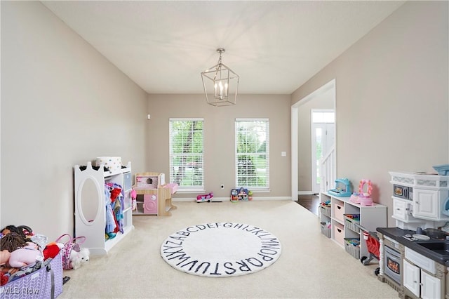 1284 Spafford Dr, Copley, OH 44321 - game room with carpet floors, a chandelier, and baseboards