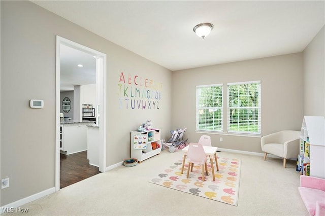 1284 Spafford Dr, Copley, OH 44321 - rec room with carpet floors and baseboards