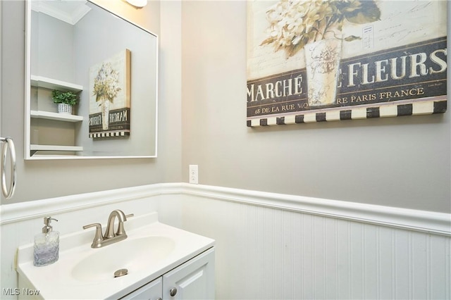 1284 Spafford Dr, Copley, OH 44321 - bathroom with a wainscoted wall, vanity, and crown molding