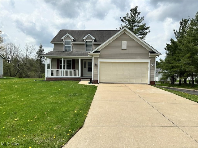 traditional home featuring covered porch, concrete driveway, a front yard, and an attached garage