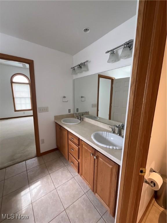 1245 Sageberry Dr, North Lima, OH 44452 - full bath with double vanity and tile patterned flooring