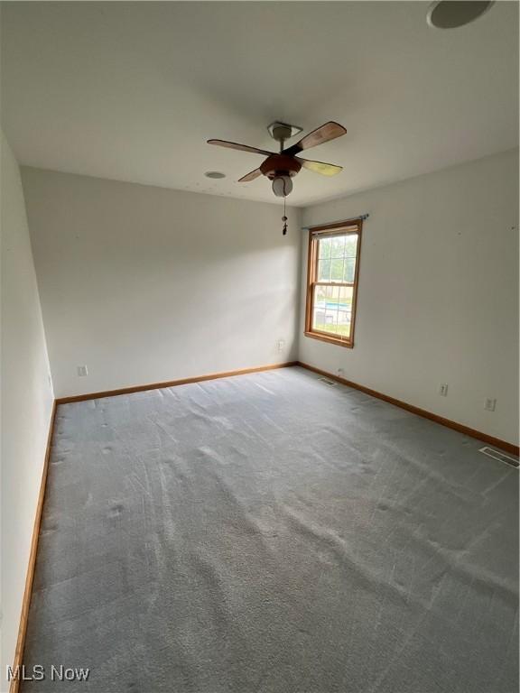 1245 Sageberry Dr, North Lima, OH 44452 - unfurnished room featuring a ceiling fan and carpet