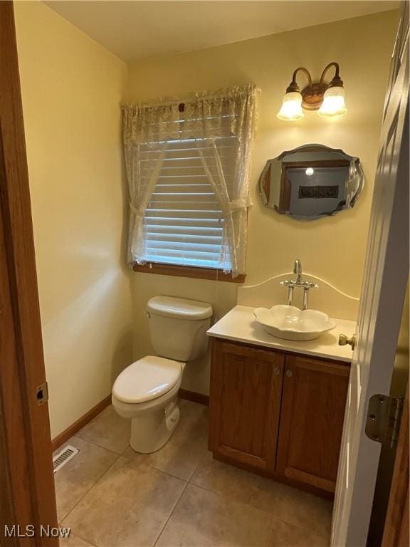 1245 Sageberry Dr, North Lima, OH 44452 - half bath featuring vanity and tile patterned floors