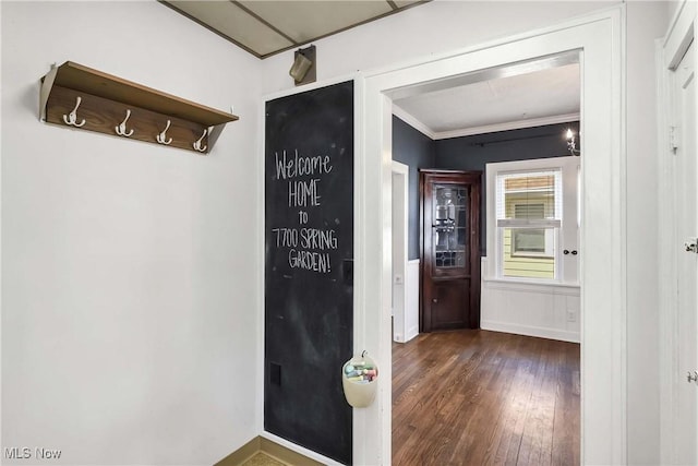 7700 Spring Garden Rd, Parma, OH 44129 - corridor with wood finished floors, baseboards, and ornamental molding