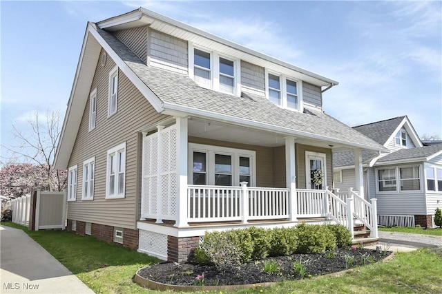 7700 Spring Garden Rd, Parma, OH 44129 - bungalow-style house with covered porch and a shingled roof