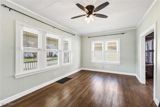 7700 Spring Garden Rd, Parma, OH 44129 - empty room with ornamental molding, baseboards, wood finished floors, plenty of natural light, and a ceiling fan