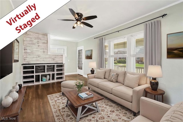 7700 Spring Garden Rd, Parma, OH 44129 - living room with wood finished floors, ceiling fan, ornamental molding, and baseboards