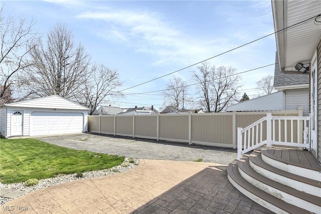7700 Spring Garden Rd, Parma, OH 44129 - view of yard with an outbuilding and a garage