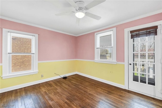 7700 Spring Garden Rd, Parma, OH 44129 - unfurnished room with baseboards, hardwood / wood-style floors, crown molding, and a ceiling fan