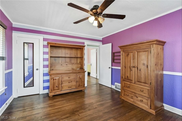 7700 Spring Garden Rd, Parma, OH 44129 - bedroom featuring dark wood-type flooring, baseboards, crown molding, a textured wall, and a ceiling fan