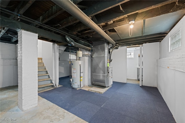 below grade area with gas water heater, heating unit, and stairway