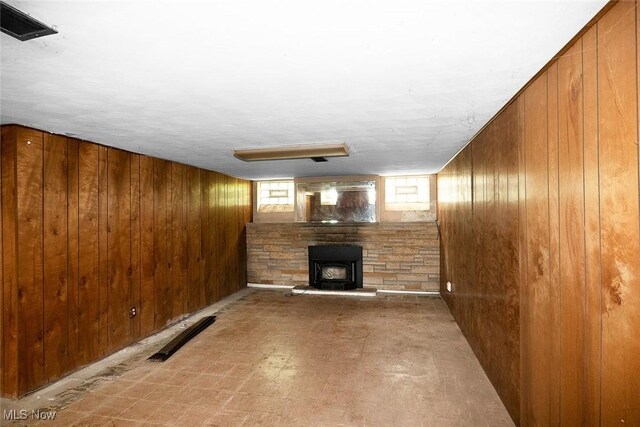 6119 E Sprague Rd, Independence, OH 44131 - below grade area featuring wood walls and tile patterned floors