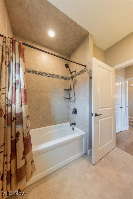 bathroom with shower / tub combo, tile patterned floors, and recessed lighting