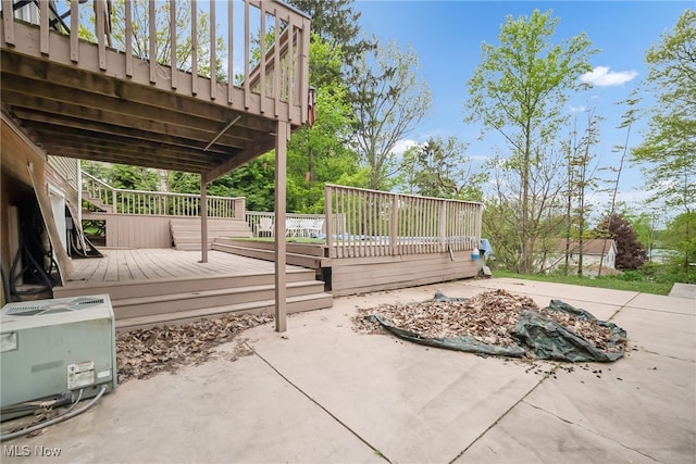 view of patio featuring a deck and cooling unit