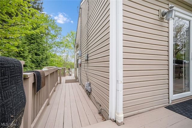 view of side of home featuring a deck