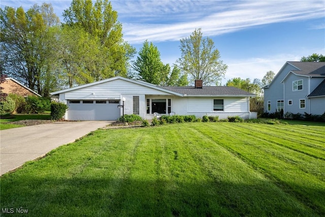 24660 Sittingbourne Ln, Beachwood, OH 44122 - ranch-style home featuring a garage, driveway, a front yard, and a chimney