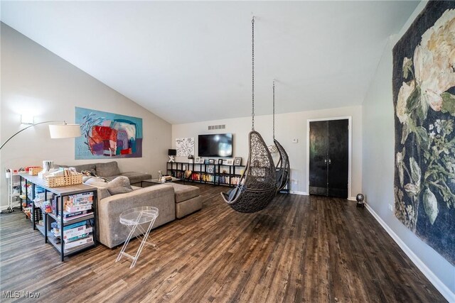 24660 Sittingbourne Ln, Beachwood, OH 44122 - living room with vaulted ceiling, wood finished floors, and baseboards