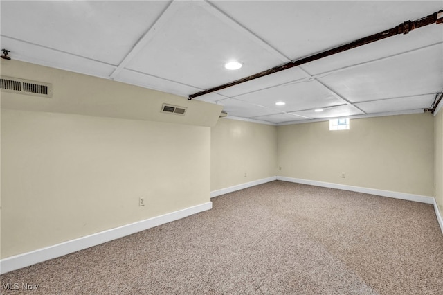 below grade area with baseboards, recessed lighting, and carpet flooring