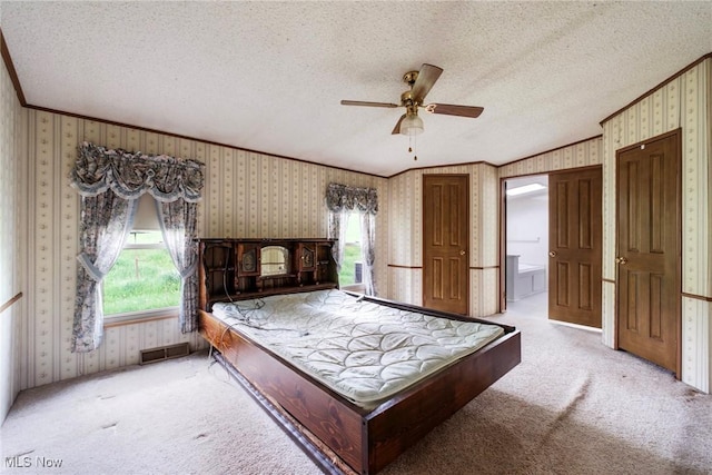 9493 State Route 9, Hanoverton, OH 44423 - bedroom featuring wallpapered walls, carpet flooring, ornamental molding, multiple windows, and a textured ceiling