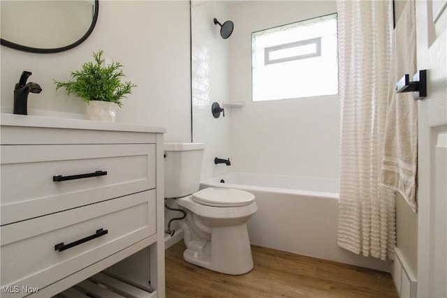 1674 Yolanda Dr, Austintown, OH 44511 - bathroom with shower / tub combo with curtain, toilet, vanity, and wood finished floors