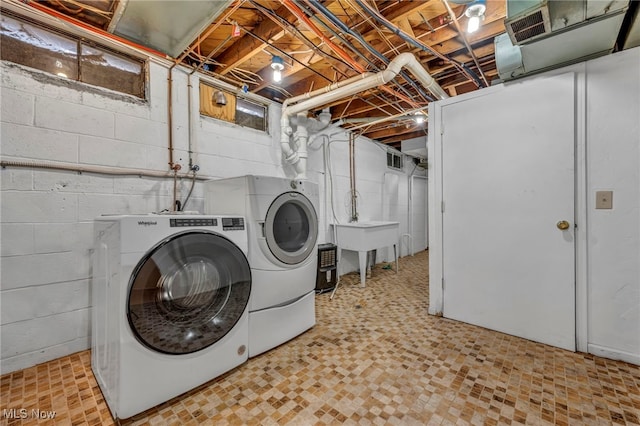 washroom with washer and clothes dryer