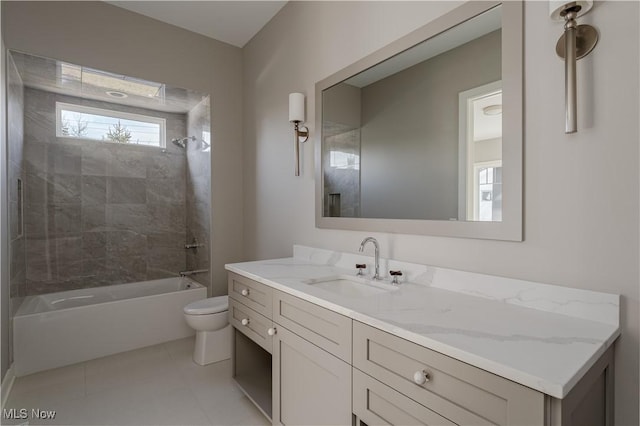 full bathroom featuring toilet, vanity, shower / washtub combination, and tile patterned flooring