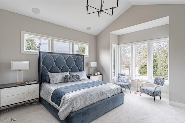 bedroom with multiple windows, carpet flooring, a chandelier, baseboards, and high vaulted ceiling