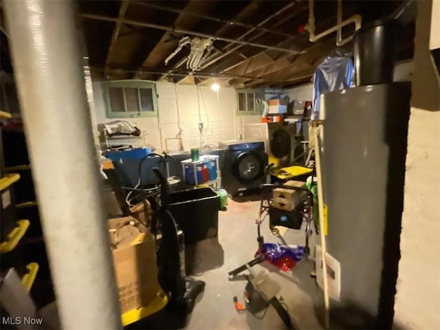 utility room featuring water heater
