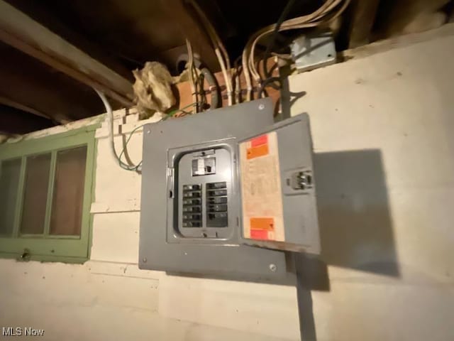 utility room featuring electric panel