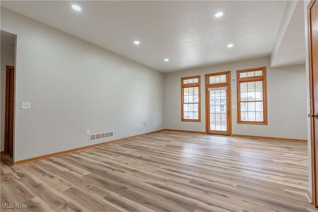 847 Beverly Ave, Canal Fulton, OH 44614 - unfurnished room with light wood-type flooring, baseboards, and recessed lighting