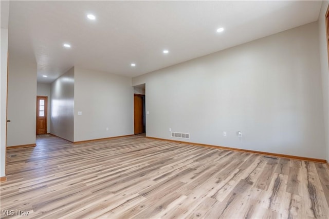 847 Beverly Ave, Canal Fulton, OH 44614 - empty room featuring light wood-style floors, recessed lighting, and baseboards