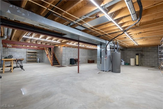 847 Beverly Ave, Canal Fulton, OH 44614 - unfinished basement featuring water heater, stairs, heating unit, and concrete block wall