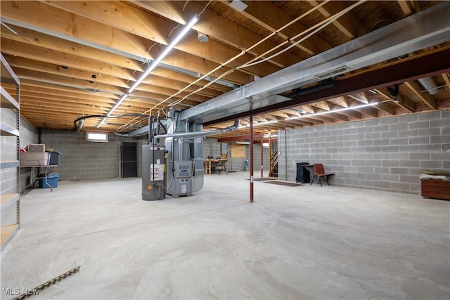 847 Beverly Ave, Canal Fulton, OH 44614 - unfinished basement with water heater and heating unit