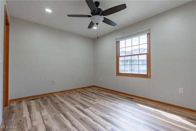 847 Beverly Ave, Canal Fulton, OH 44614 - spare room with light wood-style flooring, baseboards, ceiling fan, and recessed lighting