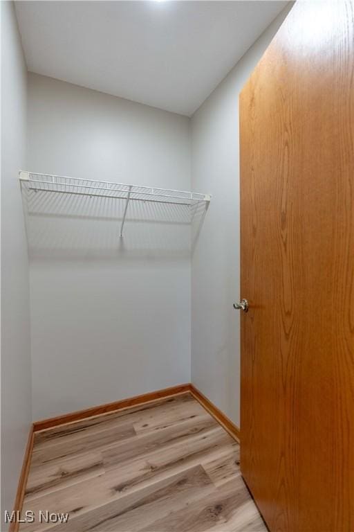 847 Beverly Ave, Canal Fulton, OH 44614 - spacious closet featuring light wood-style flooring