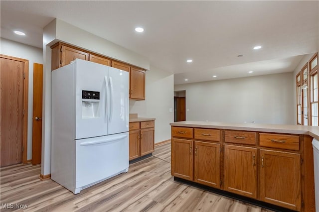 847 Beverly Ave, Canal Fulton, OH 44614 - kitchen featuring white appliances, light wood-style flooring, light countertops, recessed lighting, and brown cabinets