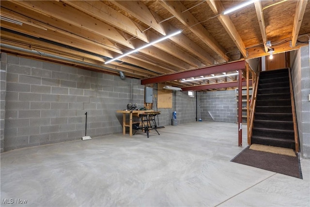 847 Beverly Ave, Canal Fulton, OH 44614 - unfinished below grade area with electric panel, stairs, and concrete block wall