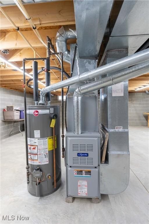 847 Beverly Ave, Canal Fulton, OH 44614 - utility room with water heater