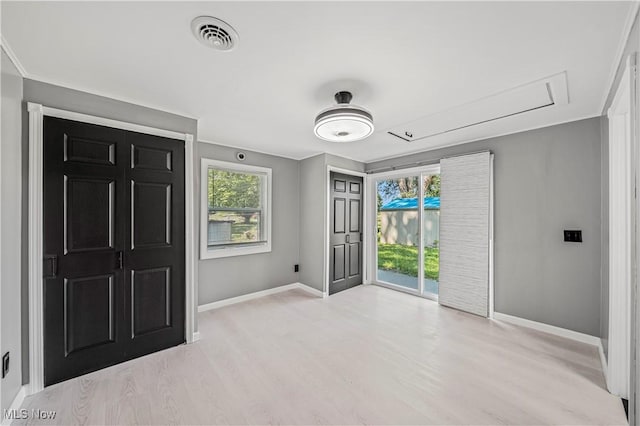 6329 Green Rd, North Kingsville, OH 44004 - foyer entrance featuring baseboards and light wood-type flooring