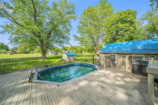 6329 Green Rd, North Kingsville, OH 44004 - outdoor pool featuring a wooden deck and a lawn