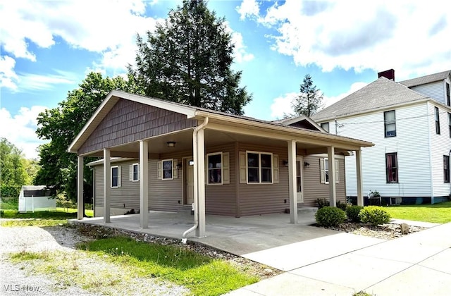 102 Maple, Bethesda, OH 43719 - view of front of house featuring driveway